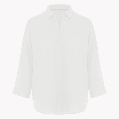 White blouse on a light gray background