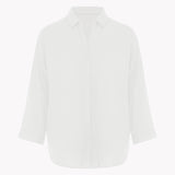 White blouse on a light gray background